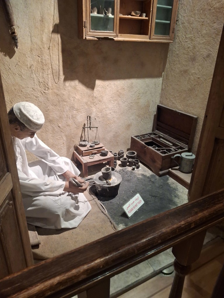 "premitive living_gold smith"