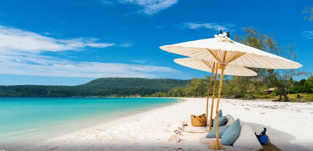 Clear turquoise waters and soft white sand beach in Koh Rong, Cambodia