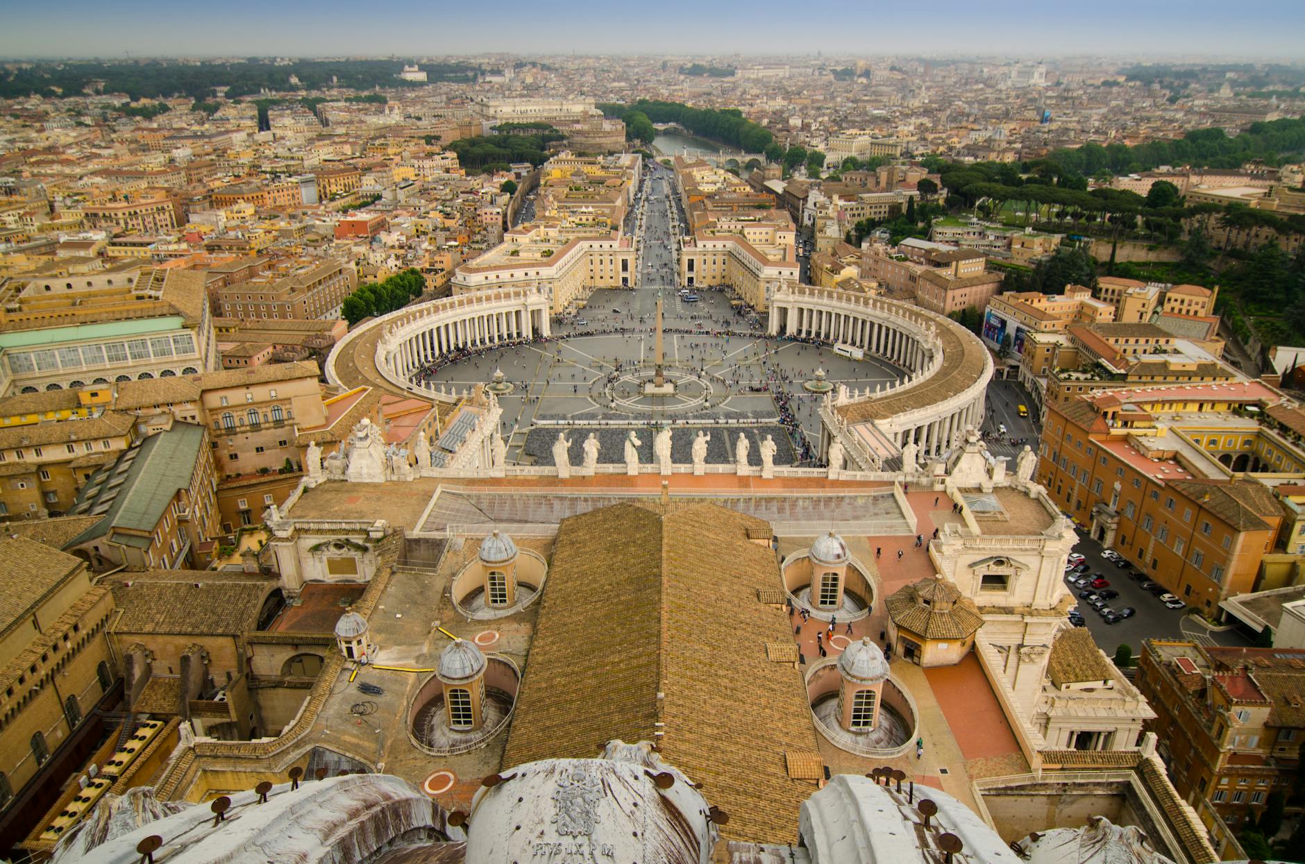 Aerial view of Vatican City showcasing St. Peter's Square and the surrounding architecture.