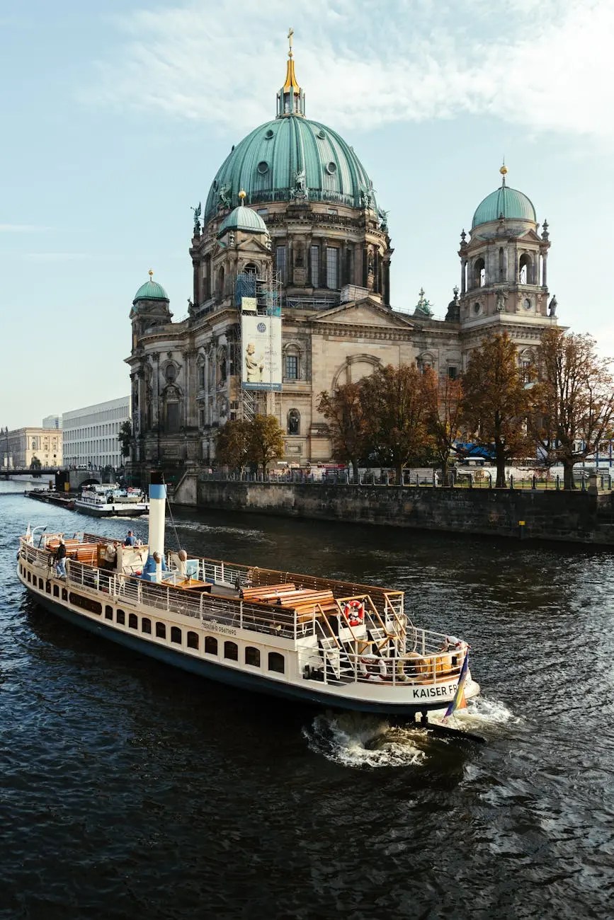 A boat cruising along the Spree River, with the impressive dome of the Berliner Dom (Berlin Cathedral) in the background, showcasing its historic architecture.