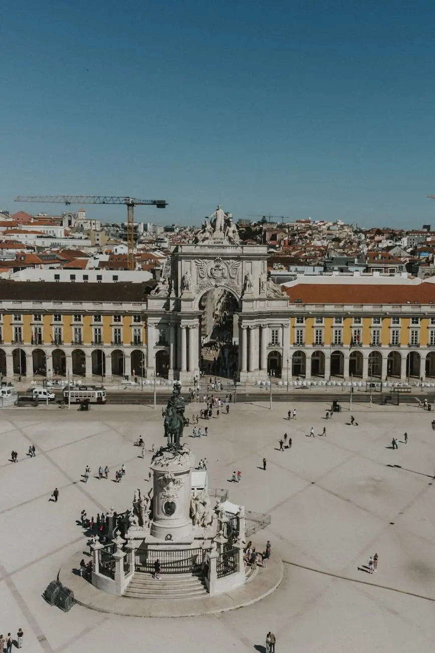 Aerial view of Praça da Comércio in porto, Portugal, featuring the grand arch, statue at the center, and surrounding historical buildings with people walking around.