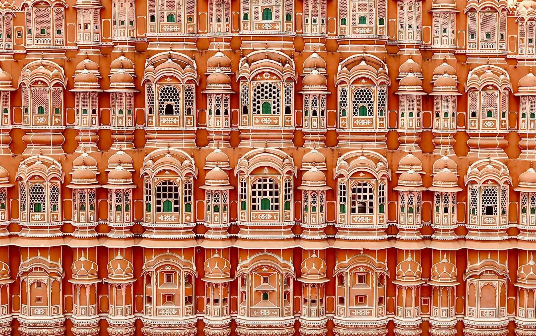 Close-up view of the ornate facade of Hawa Mahal, also known as the Palace of Winds, showcasing its intricate lattice windows and pink sandstone architecture.