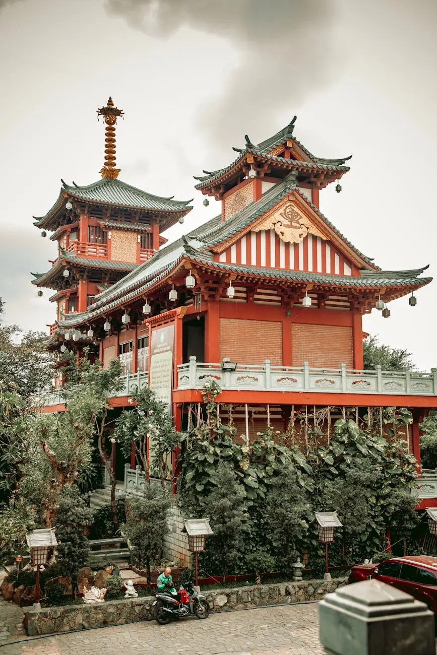 A beautifully designed temple in Ho Chi Minh City with traditional architecture, featuring ornate roofs and greenery surrounding the structure.
