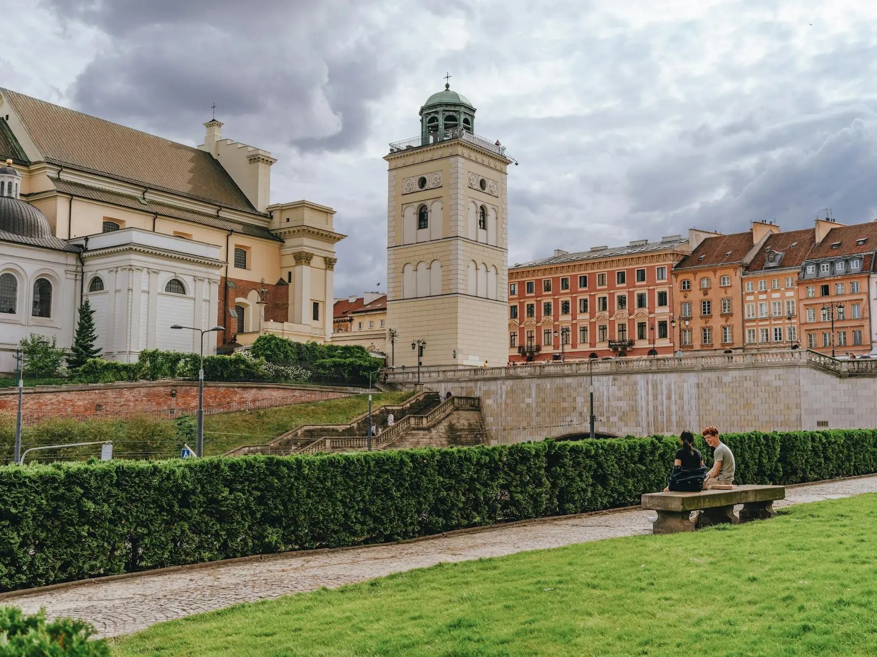 This image features the magnificent St. Anne's Church, one of the oldest and most important churches in Warsaw. Its elaborate Baroque facade, characterized by intricate details and striking twin bell towers, dominates the view at the entrance to the city's historic Old Town. Located adjacent to Castle Square, the church has witnessed centuries of Polish history. While its interior is beautifully decorated, the real hidden gem is the viewing terrace at the top of its bell tower, which offers a breathtaking, unobstructed vista of the Vistula River, the Royal Castle, and the city's sprawling skyline—a must-do for any visitor.