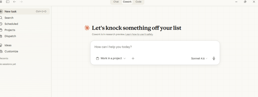Claude Cowork main interface after successful Windows restart showing "Let's knock something off your list" with options for New task, Search, Scheduled, Projects, and Dispatch